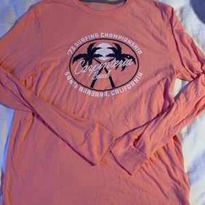 Peach colored long sleeve surf tee